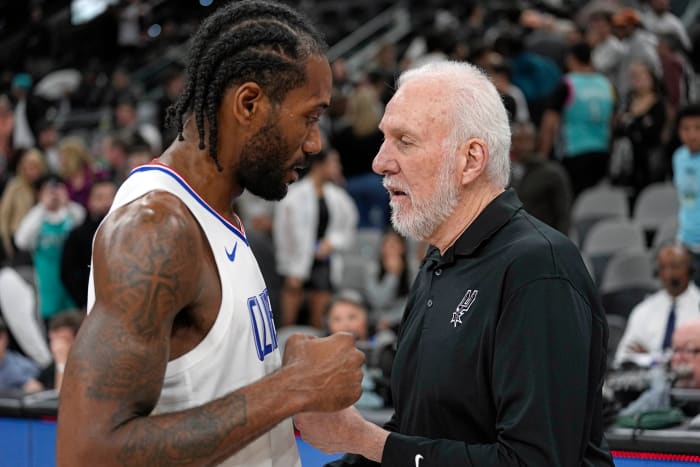 Nov 22, 2023; San Antonio, Texas, USA; San Antonio Spurs head coach Gregg Popovich talks with Los Angeles Clippers forward Kawhi Leonard (2) after a game at Frost Bank Center.